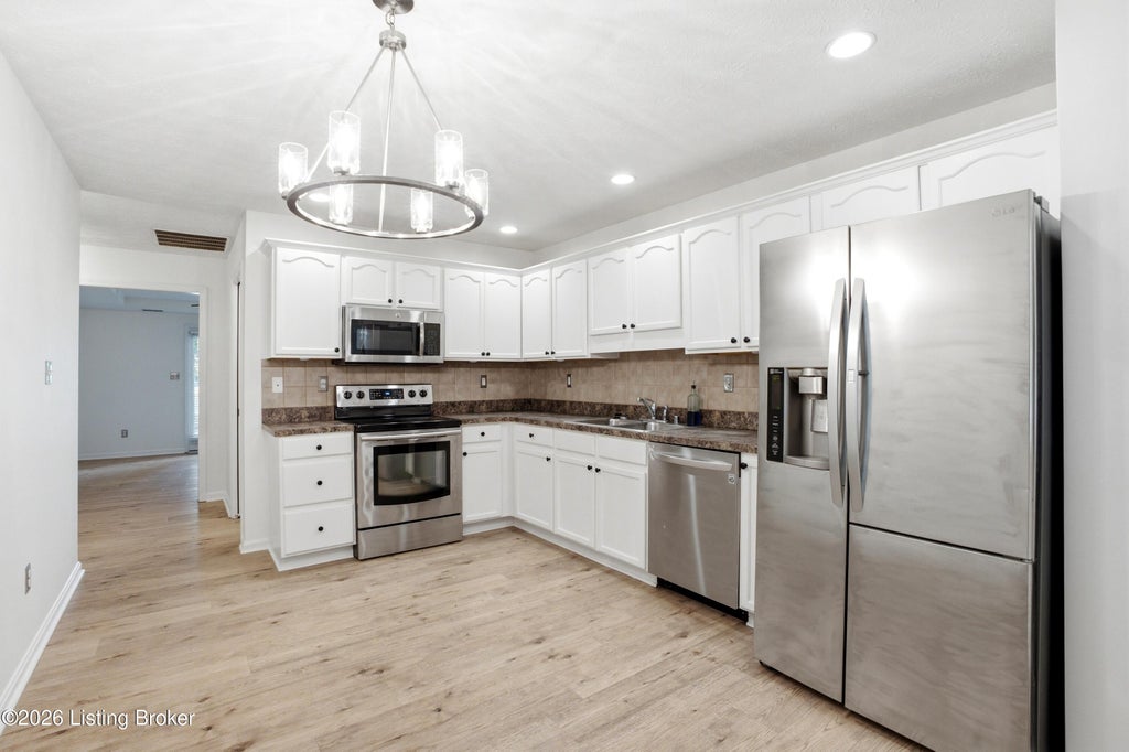 Photo of 853 Garden Pointe Dr, Simpsonville, KY 40067 (MLS # 1723543)