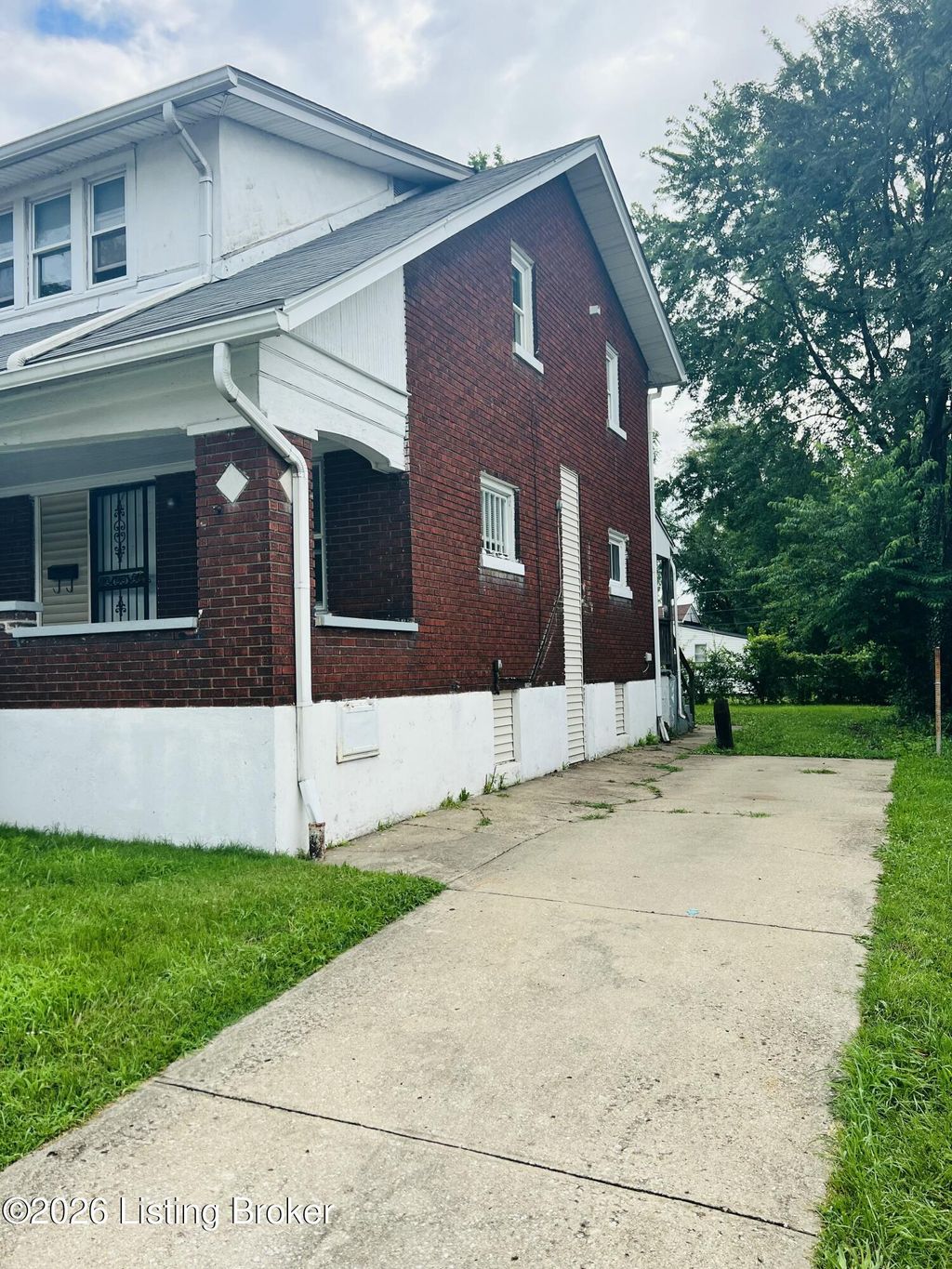Photo of 305 Louis Coleman Jr Dr, Louisville, KY 40212 (MLS # 1723114)