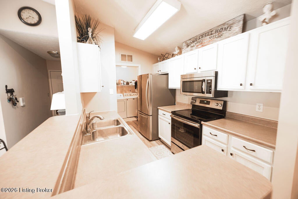 Photo of 1303 Taxus Top Ln #203, Louisville, KY 40243 (MLS # 1728879)
