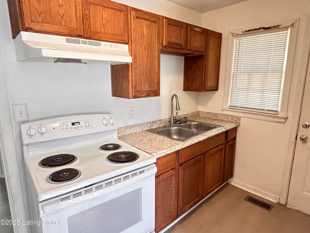 Photo of 3813 Powell Ave, Louisville, KY 40215 (MLS # 1700237)