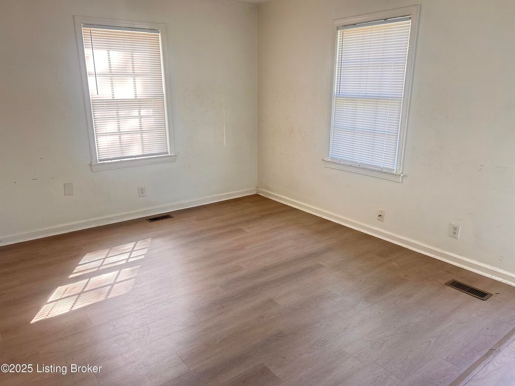 Photo of 3813 Powell Ave, Louisville, KY 40215 (MLS # 1700237)