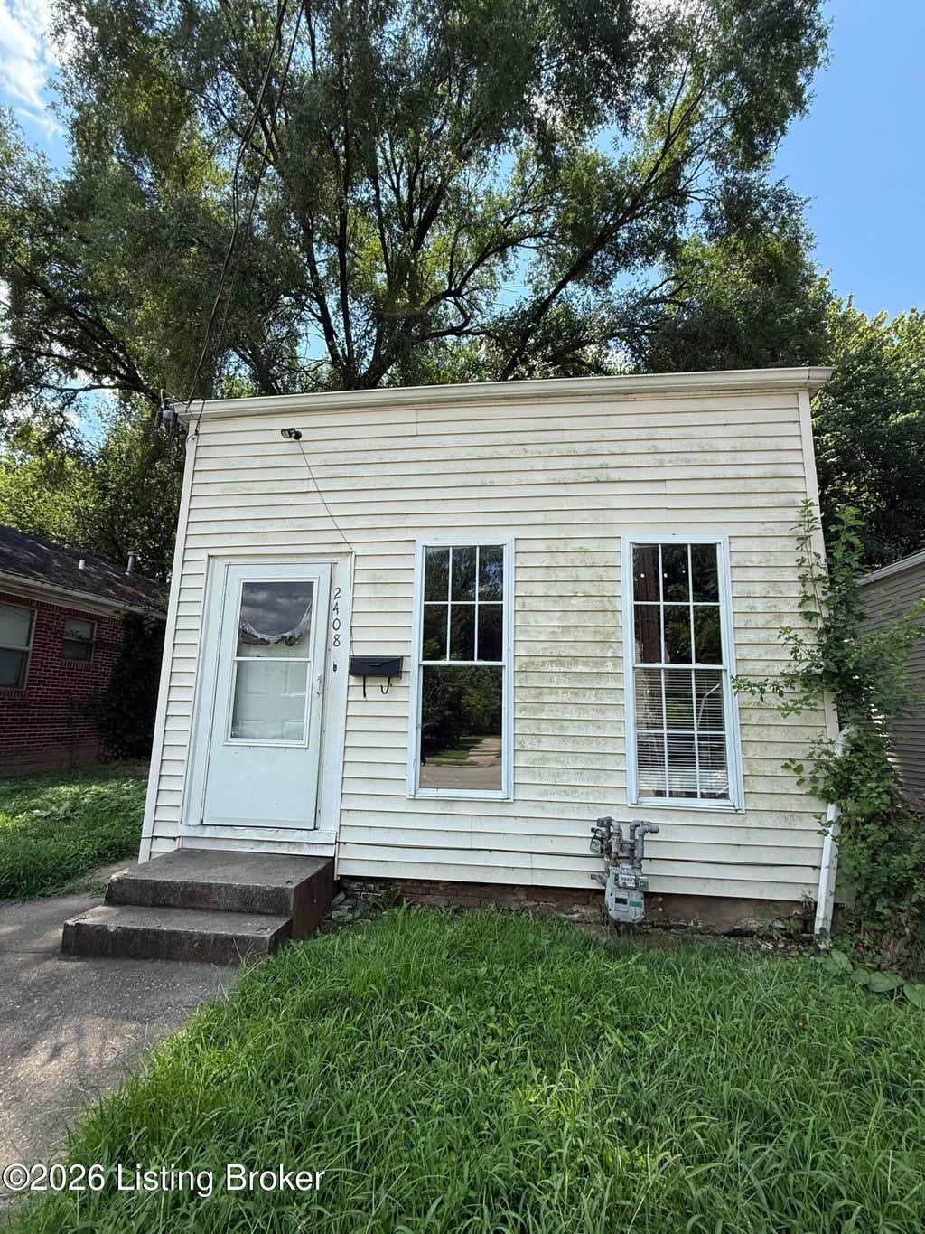 Photo of 2408 Rowan St, Louisville, KY 40212 (MLS # 1726505)
