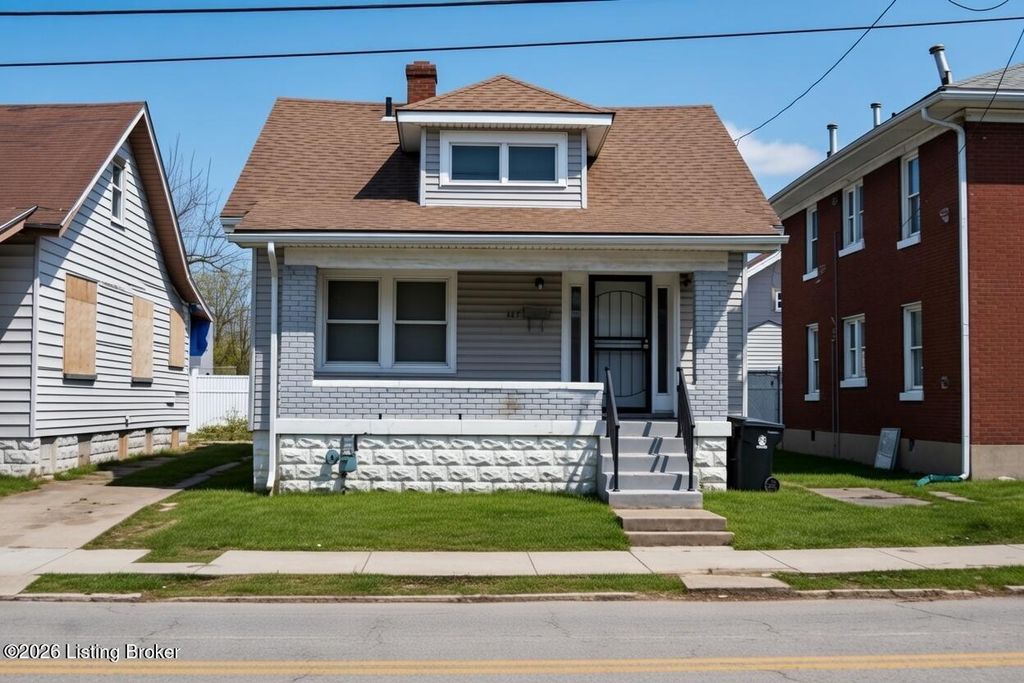 Photo of 449 Louis Coleman Junior Dr, Louisville, KY 40212 (MLS # 1706092)