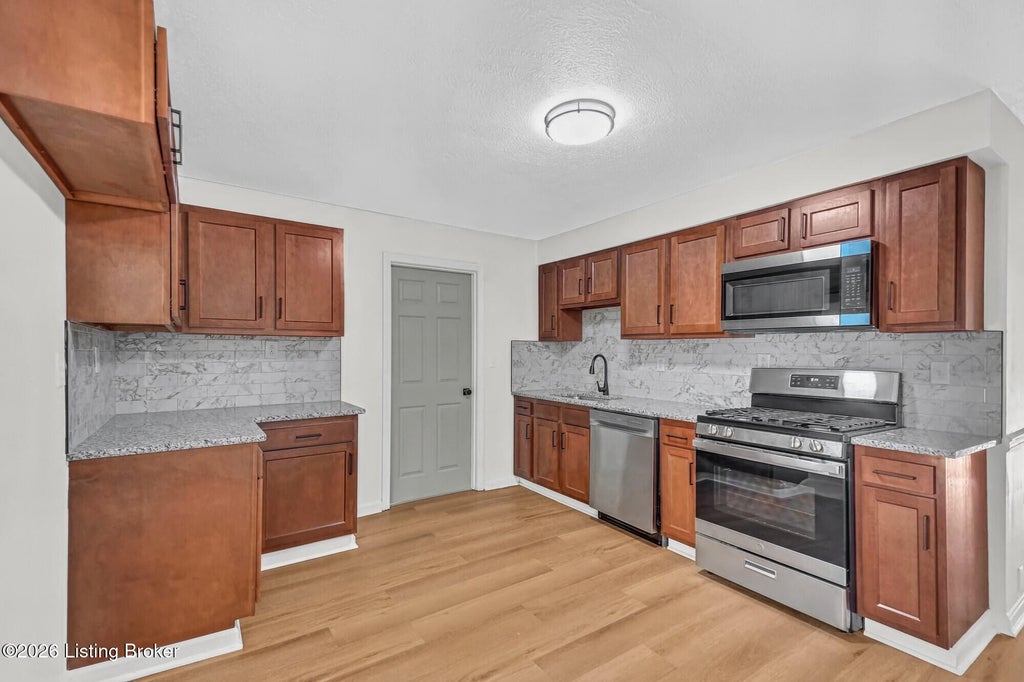 Photo of 2402 Mercer Ave, Louisville, KY 40216 (MLS # 1732618)