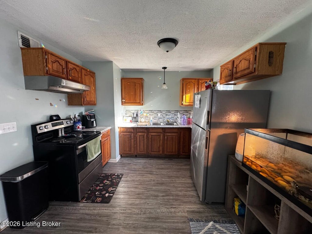 Photo of 9720 Titan Dr, Louisville, KY 40229 (MLS # 1729541)