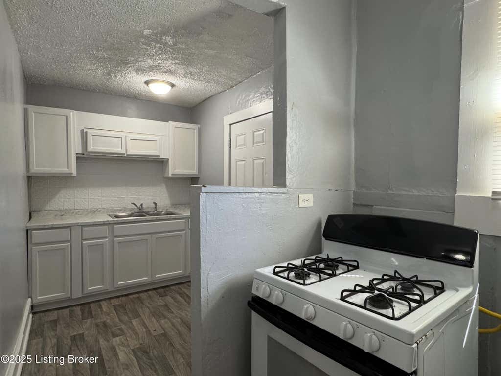 Photo of 2315 Portland Ave, Louisville, KY 40212 (MLS # 1726467)