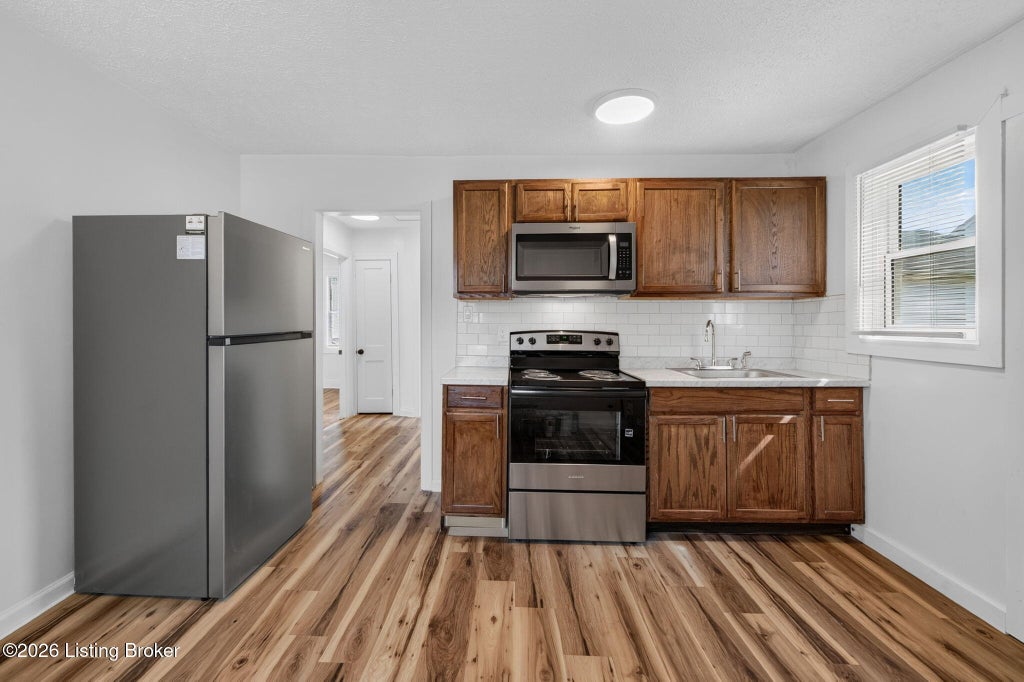 Photo of 602 W Florence Ave, Louisville, KY 40215 (MLS # 1730233)