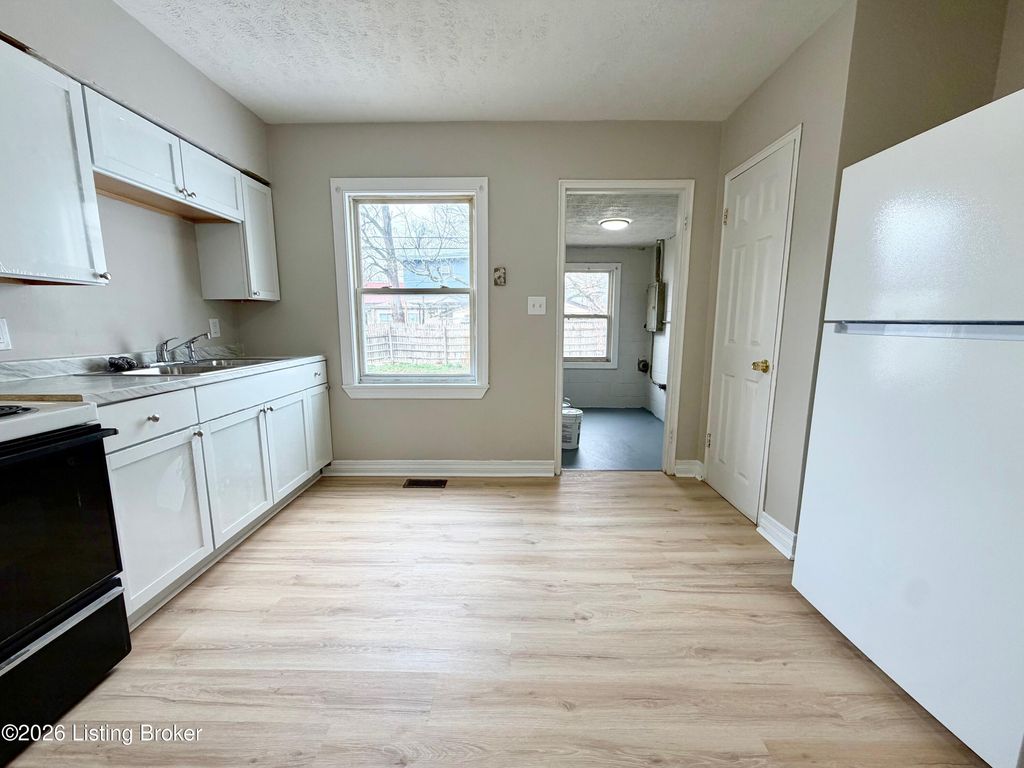 Photo of 6518 Miles Ave, Louisville, KY 40214 (MLS # 1715512)