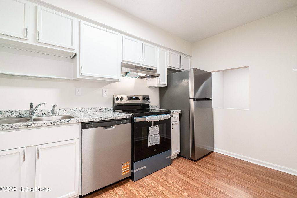 Photo of 7010 Wildwood Cir #APT 65, Louisville, KY 40291 (MLS # 1709693)