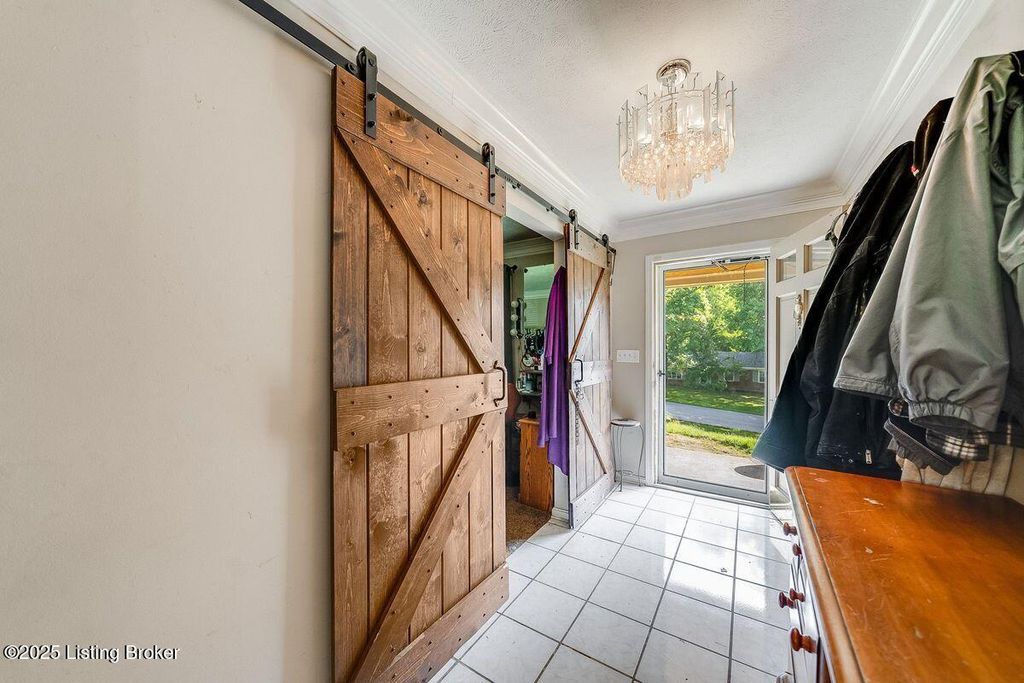 Photo of 9206 Lakeridge Dr, Louisville, KY 40272 (MLS # 1704049)