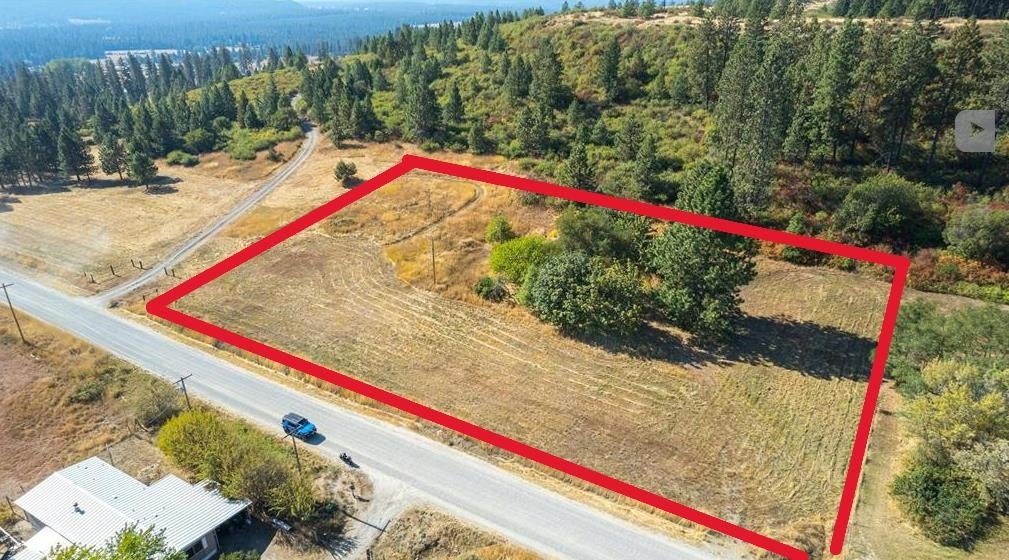 Photo of 29411 N Dunn Rd, Chattaroy, WA 99003 (MLS # 202623337)