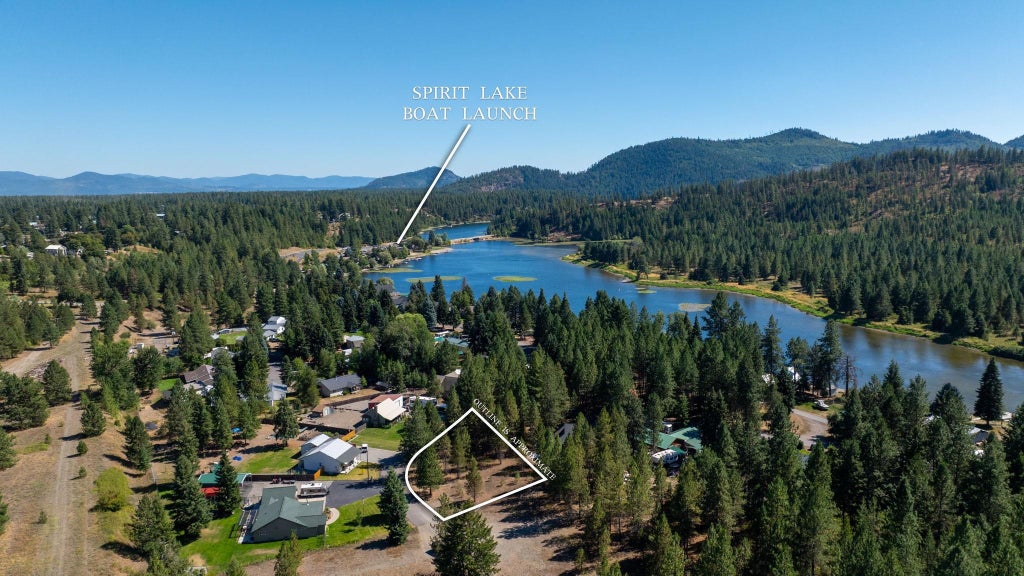 Photo of 7060 W Tesemini Dr, Spirit Lake, ID 83869 (MLS # 202618865)