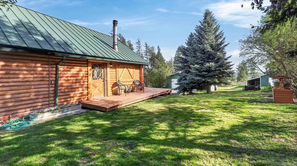 Photo of 10203 E Chinook Ln, Chattaroy, WA 99003 (MLS # 202616104)