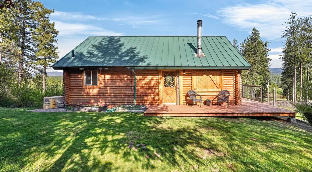 Photo of 10203 E Chinook Ln, Chattaroy, WA 99003 (MLS # 202616104)