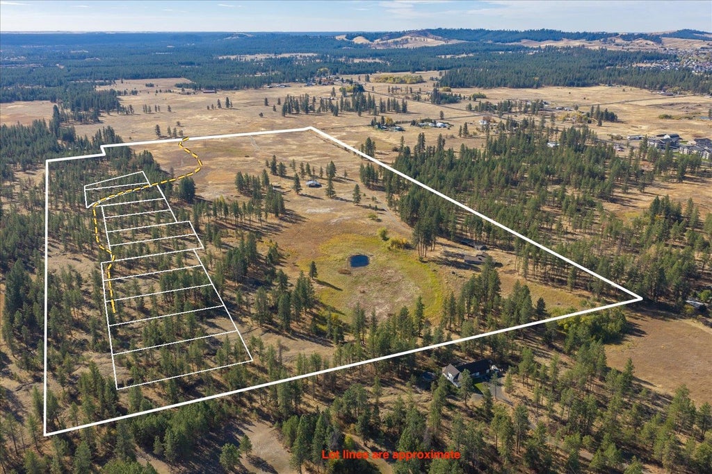 Photo of 7022 W Hallett Rd, Spokane, WA 99224 (MLS # 202625890)