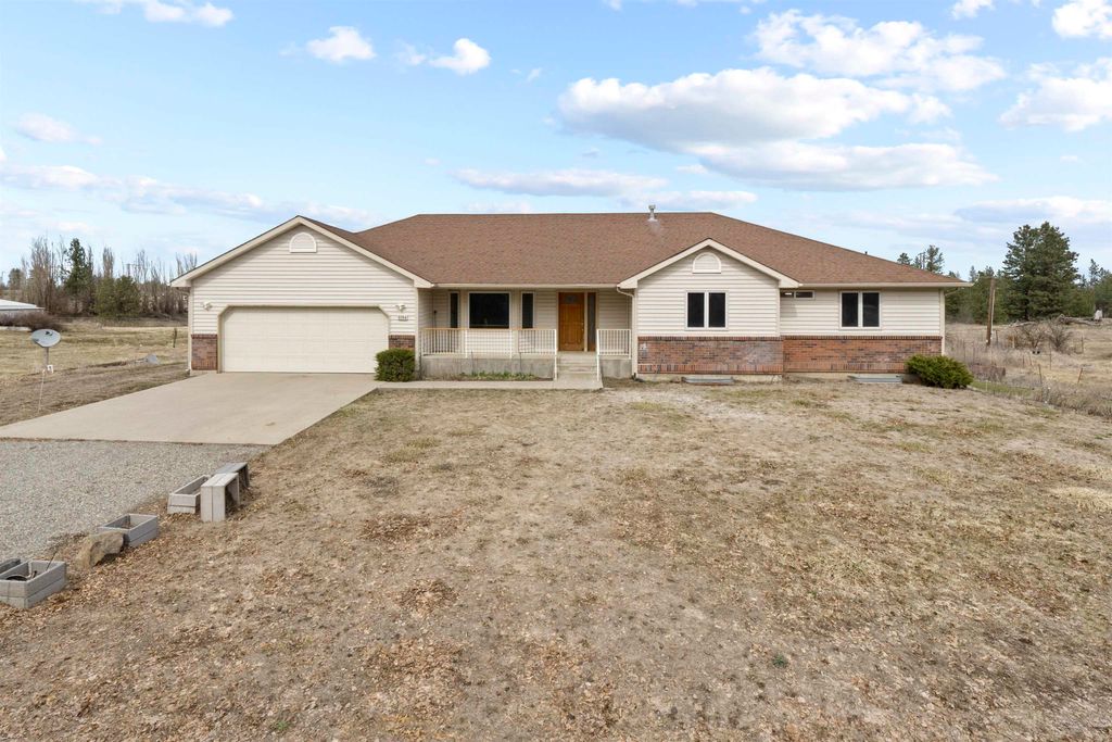 Photo of 5704 W Garden Springs Rd, Spokane, WA 99224 (MLS # 202616081)