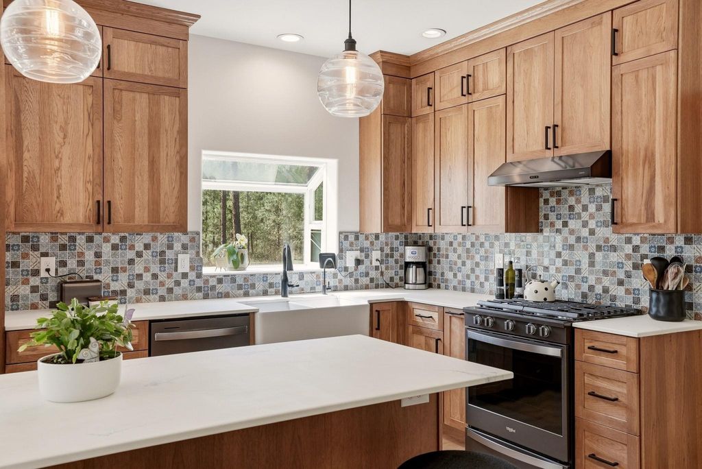 Photo of 3216 E Rocky Ridge Ave, Chattaroy, WA 99003 (MLS # 202615336)