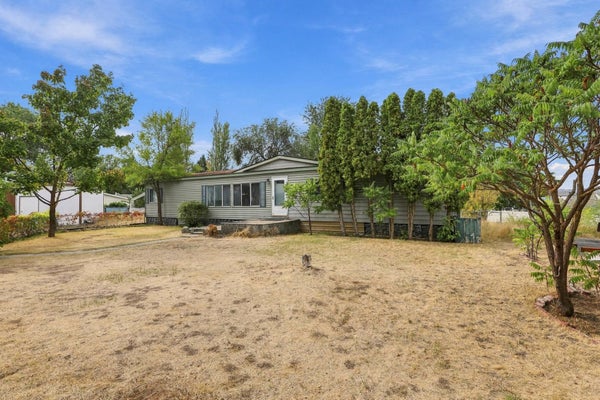 3412 E 2ND CT, MEAD, WA 99021 - Image 33c6389f964babd1fb928f95546c052d/1322029033