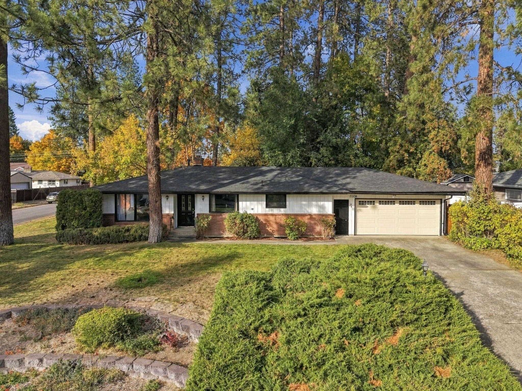 Photo of 11305 E 18th Ave, Spokane, WA 99206 (MLS # 202626125)