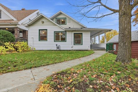 Photo of 707 E 8TH Ave, Spokane, WA 99203 (MLS # 202526535)