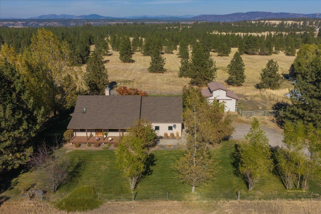 Photo of 11312 W Newkirk Rd, Spokane, WA 99224 (MLS # 202625946)