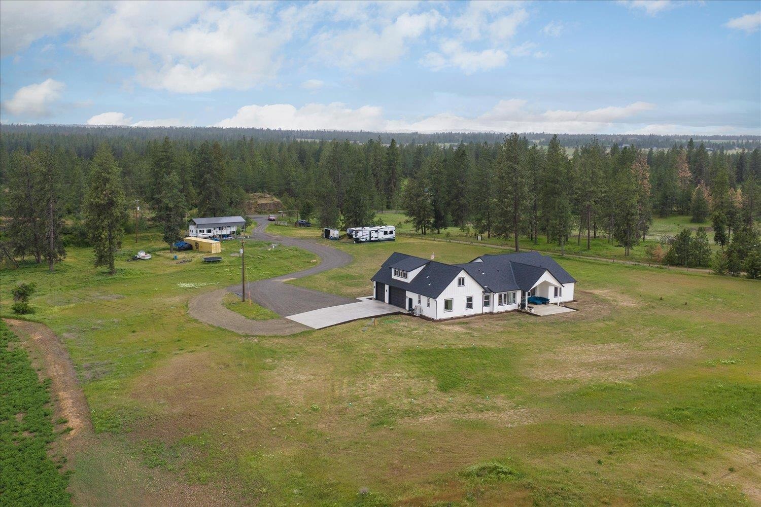 Photo 1 of 50 — 14506 W Pine Bluff Rd, Nine Mile Falls, WA 99026