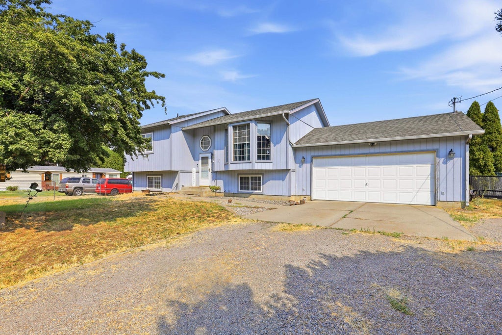 Photo of 17703 E 6th Ave, Spokane Valley, WA 99016 (MLS # 202622417)