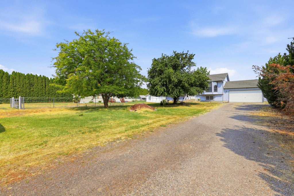 Photo of 17703 E 6th Ave, Spokane Valley, WA 99016 (MLS # 202622417)