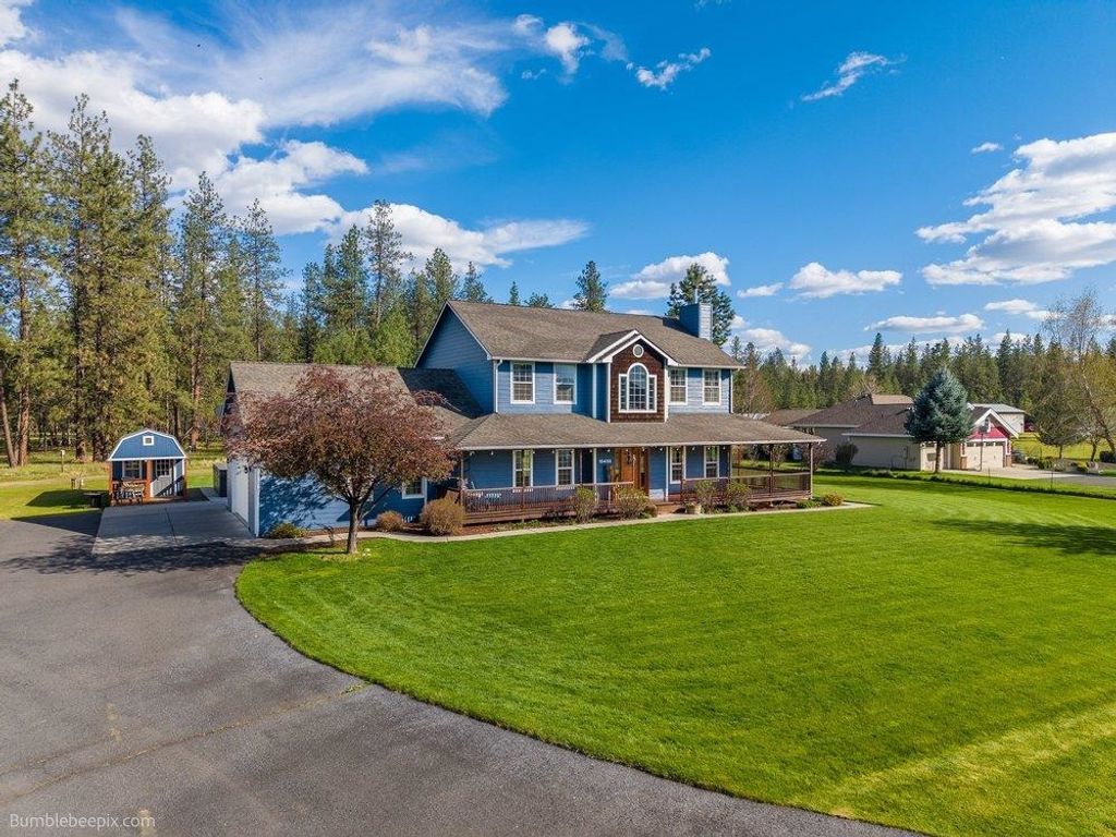 Photo of 10403 W Granger Rd, Nine Mile Falls, WA 99026 (MLS # 202616217)