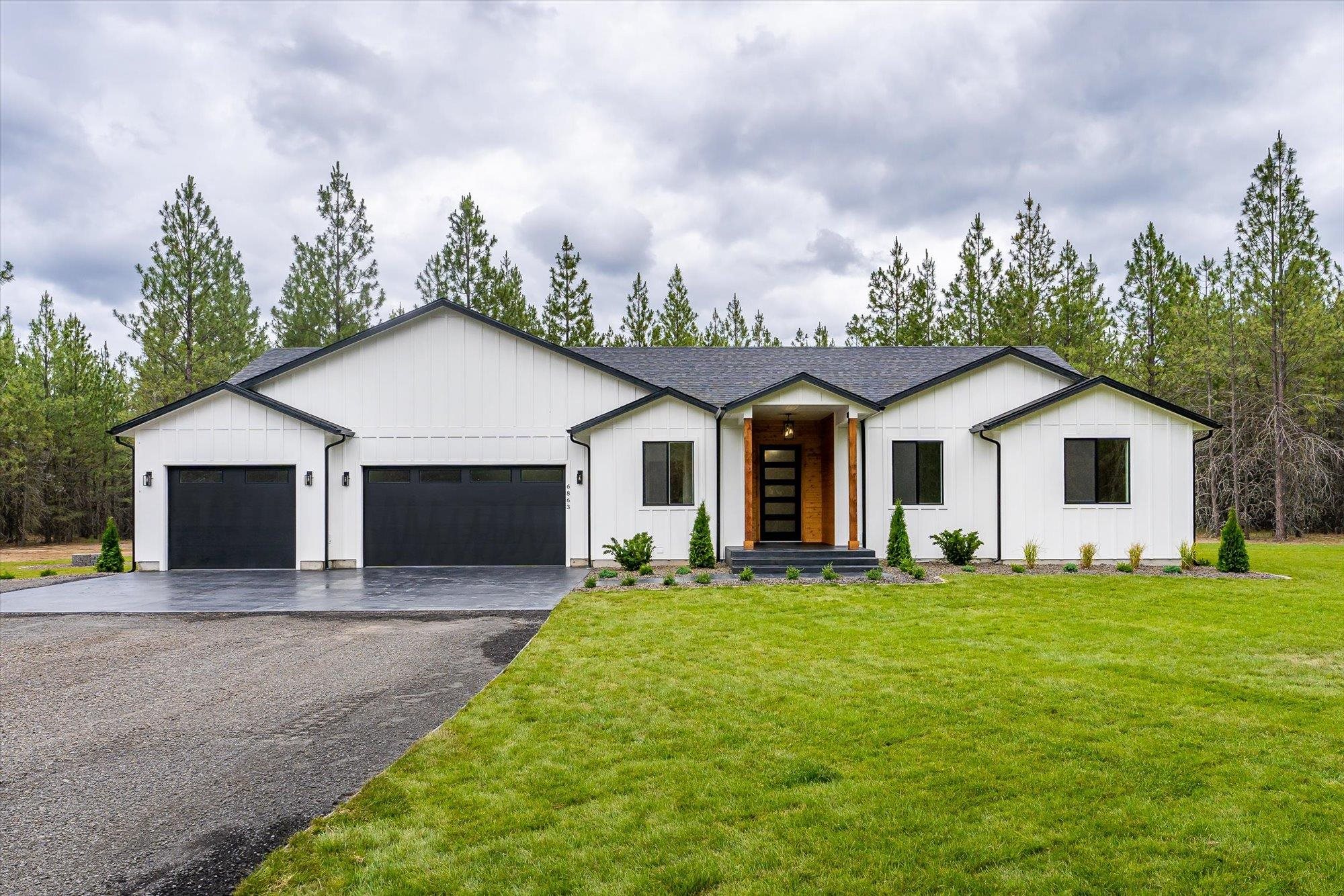 Photo 1 of 50 of 6863 E Elk Chattaroy Rd house