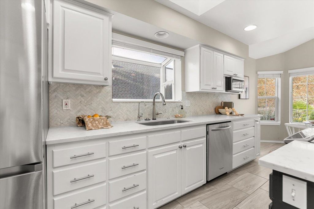 Photo of 11709 N Kathy Ln, Spokane, WA 99218 (MLS # 202616101)