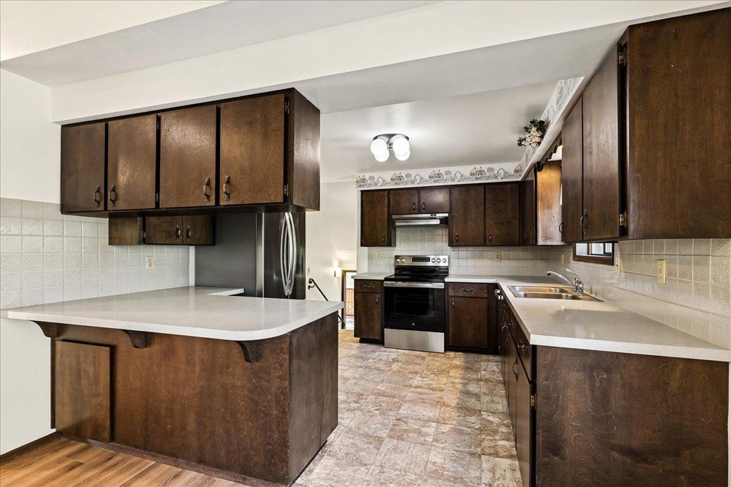 Photo of 14413 E 7TH Ave, Spokane, WA 99216 (MLS # 202625865)