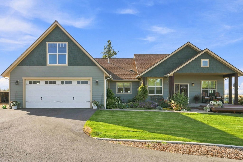 Photo of 6329 N Thierman Rd, Spokane, WA 99217 (MLS # 202624084)