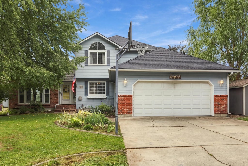 Photo of 12032 S Player Dr, Spokane, WA 99223 (MLS # 202624469)