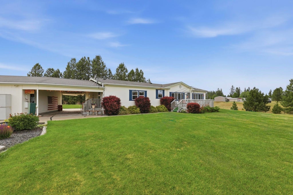 Photo of 1702 W Denison-Chattaroy Rd, Deer Park, WA 99006 (MLS # 202624566)