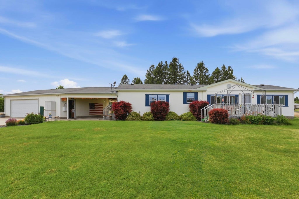 Photo of 1702 W Denison-Chattaroy Rd, Deer Park, WA 99006 (MLS # 202624566)