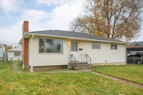 Photo of 825 E Sanson Ave, Spokane, WA 99207 (MLS # 202526968)