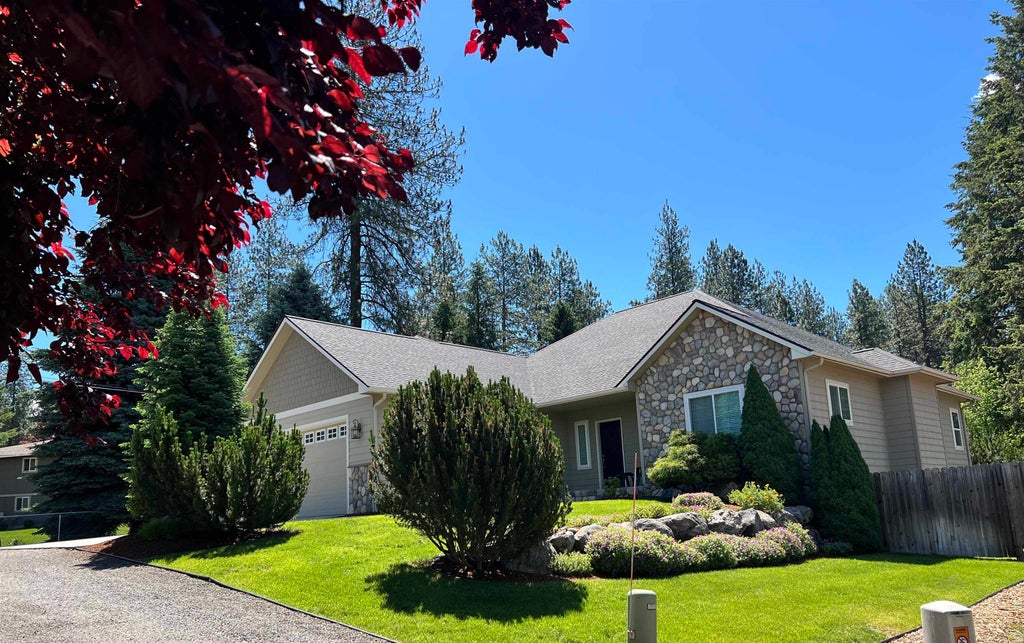 Photo of 11334 N Whitworth Dr, Spokane, WA 99218 (MLS # 202619168)