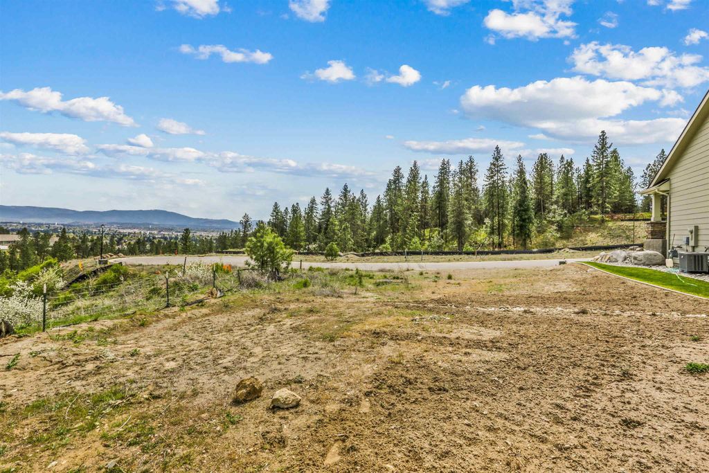 Photo of 5104 N Scenic Ln, Spokane, WA 99212 (MLS # 202616033)