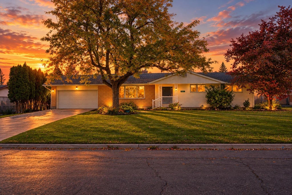 Photo of 3811 S SUNDOWN Dr, Spokane Valley, WA 99206 (MLS # 202625907)
