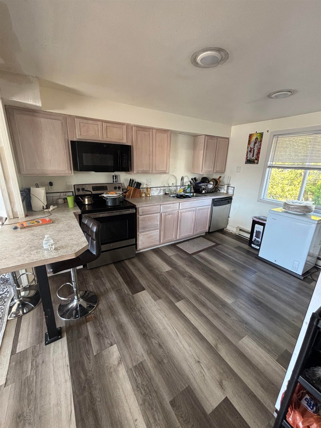 Photo of 11002 E 10TH Ave, Spokane, WA 99206 (MLS # 202626008)