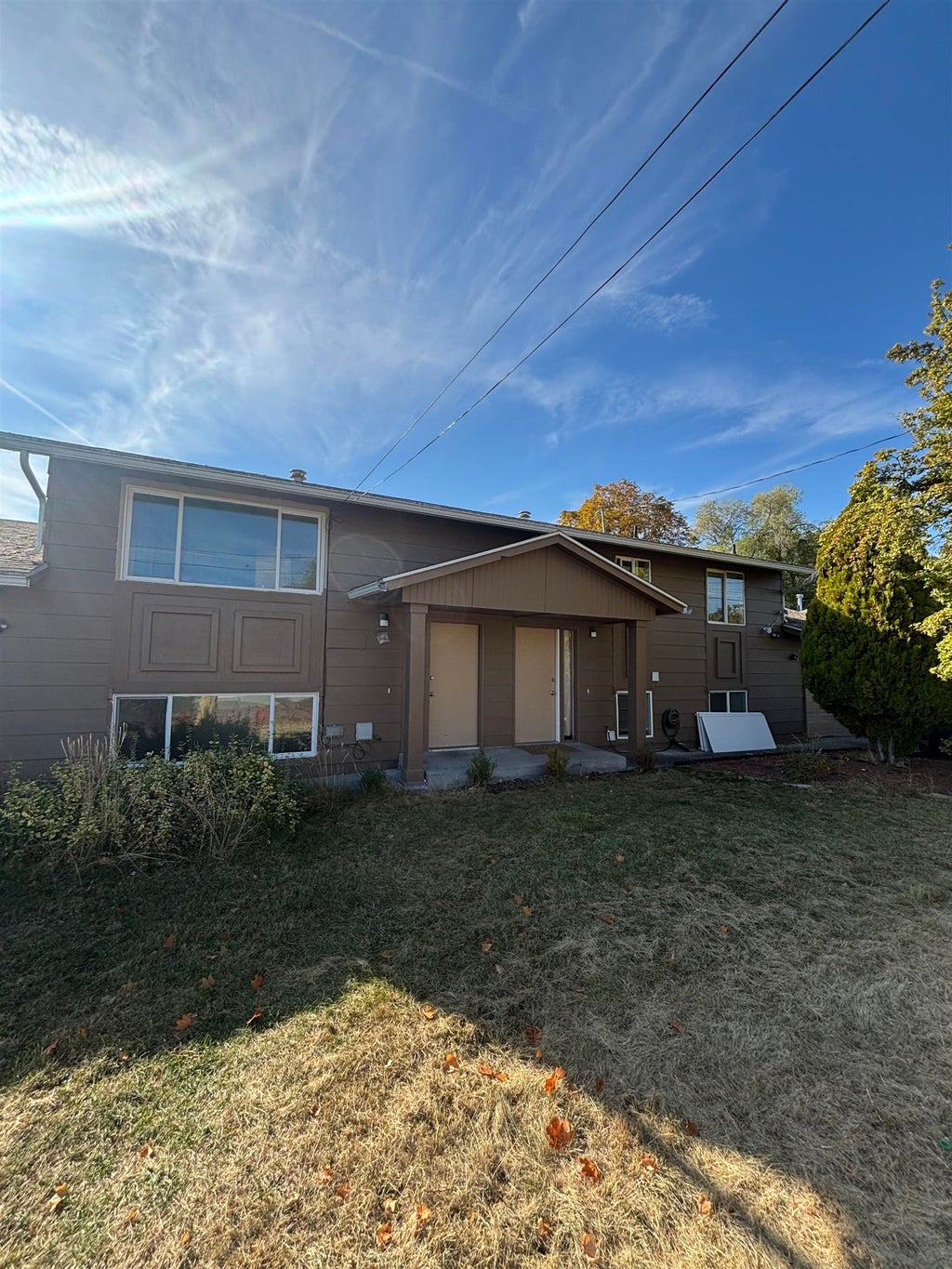 Photo of 11002 E 10TH Ave, Spokane, WA 99206 (MLS # 202626008)