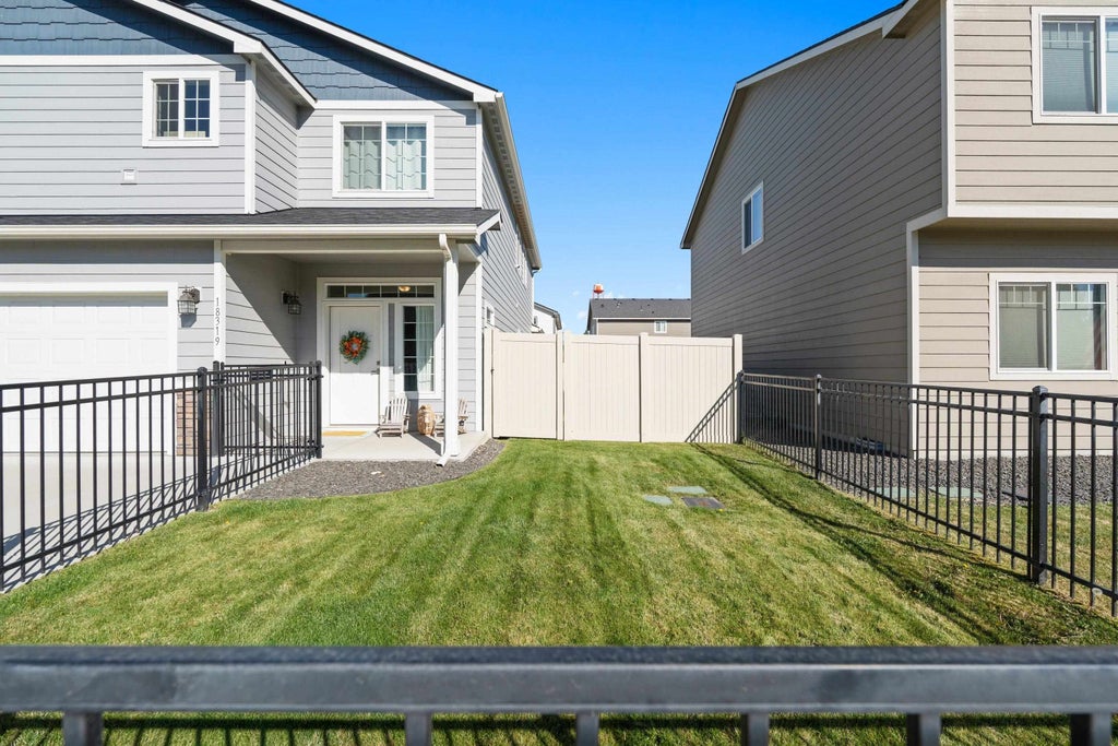 Photo of 18319 E 2nd Ave, Spokane Valley, WA 99016 (MLS # 202625457)