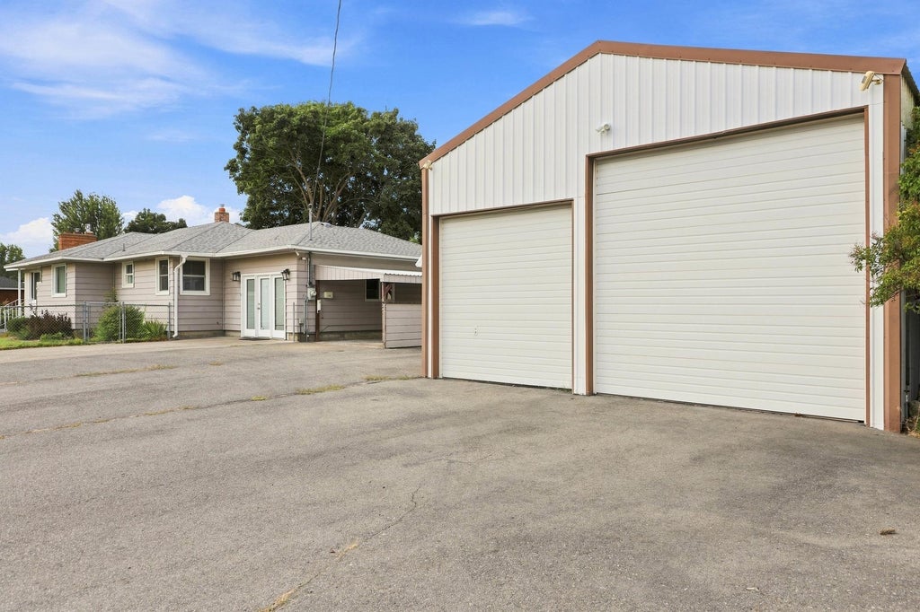 Photo of 12703 E 8th Ave, Spokane, WA 99216 (MLS # 202625806)