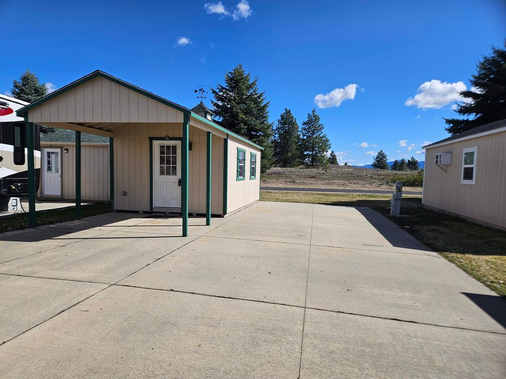 Photo of 1205 N Country Club Dr, Spokane, WA 99006 (MLS # 202614343)