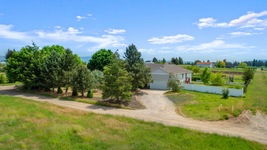 Photo of 10206 E Tate Rd, Spokane, WA 99217 (MLS # 202623458)