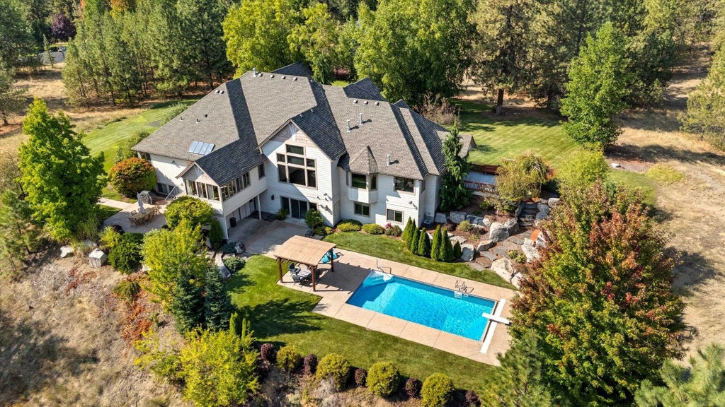 Photo of 13615 N Riverbluff Ln, Spokane, WA 99208 (MLS # 202623518)