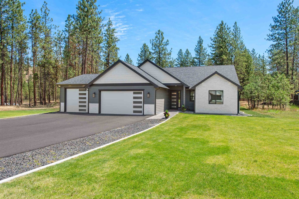 Photo of 6563 Kate Dr, Nine Mile Falls, WA 99026 (MLS # 202621989)