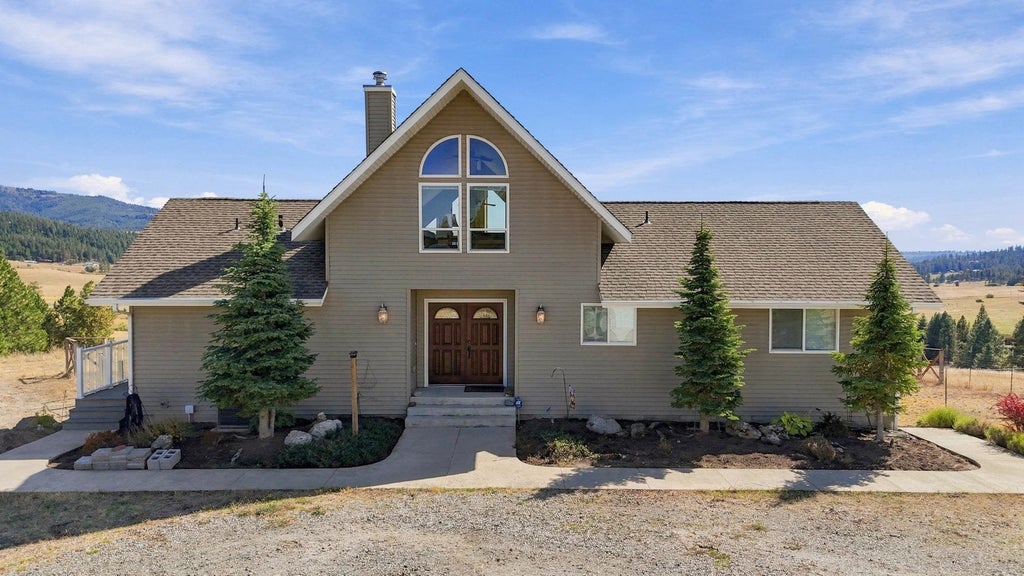 Photo of 27511 N Scotts Hill Ln, Chattaroy, WA 99003 (MLS # 202624442)