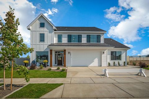 Photo of 12213 N VALENCIA Ave, Spokane, WA 99218 (MLS # 202526707)